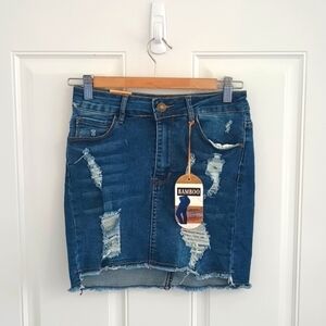 NWT  medium wash Bamboo distressed denim mini skirt size 5 / 27 stretchy